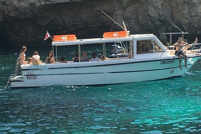 Comino and Gozo Private Boat Tour : Julie Pearl Boat - The Elephant Rock photo pass and Santa Maria Caves