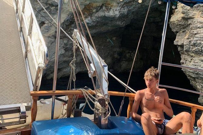 Comino, Blue Lagoon and Caves. Tour A - Onboard Comfort: Sun Deck, Shade Deck, Showers, and Toilets