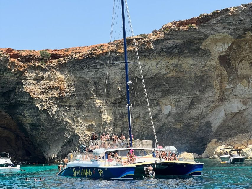 Comino: Blue Lagoon Catamaran Cruise with Lunch and Open Bar - Music and dancing after lunch: how to enjoy it without suffering