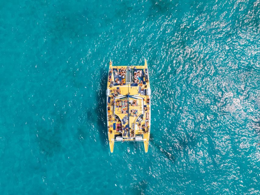 Comino: Blue Lagoon Catamaran Cruise with Lunch and Open Bar - The vibe on Spirit of Malta: cruise first, tour second