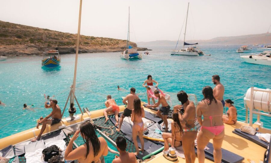 Comino: Blue Lagoon Catamaran Cruise with Lunch and Open Bar - Swim and snorkeling stops: what you’re paying for
