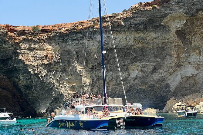 Comino Blue Lagoon Prime Catamaran Tour with All Inclusive - Crew, Music, and the On-Board Mood