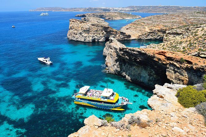 Comino Island: including Blue Lagoon, Crystal Lagoon & sea caves - Blue Lagoon Time: prime mooring, slides, and the crowd reality