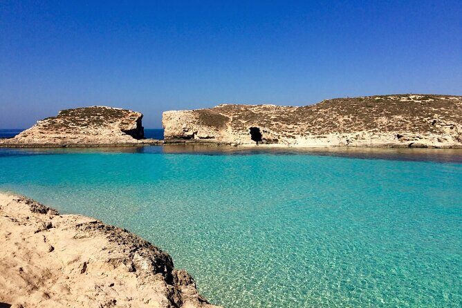 Comino Private Boat Tour in Malta - Entering the Blue Lagoon: Sand Bottom, Knights, and a Real Swim Pause