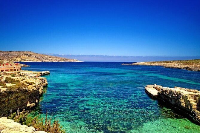 Comino Private Boat Tour in Malta - Cominotto Reef: The Swim-Through Cave and the Tiny “Land” Break