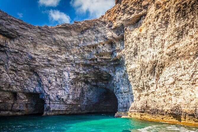 Explore Comino, Blue Lagoon & Caves - Private speed boat - Half Rock and the Gozo view: your last chance for a swim