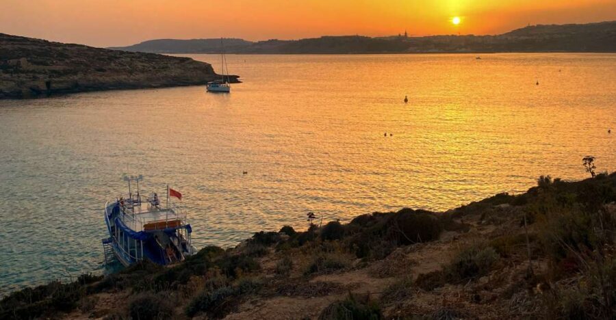 From Bugibba: Blue Lagoon Sunset Cruise - Sunset cruise mood: why Comino at night feels different