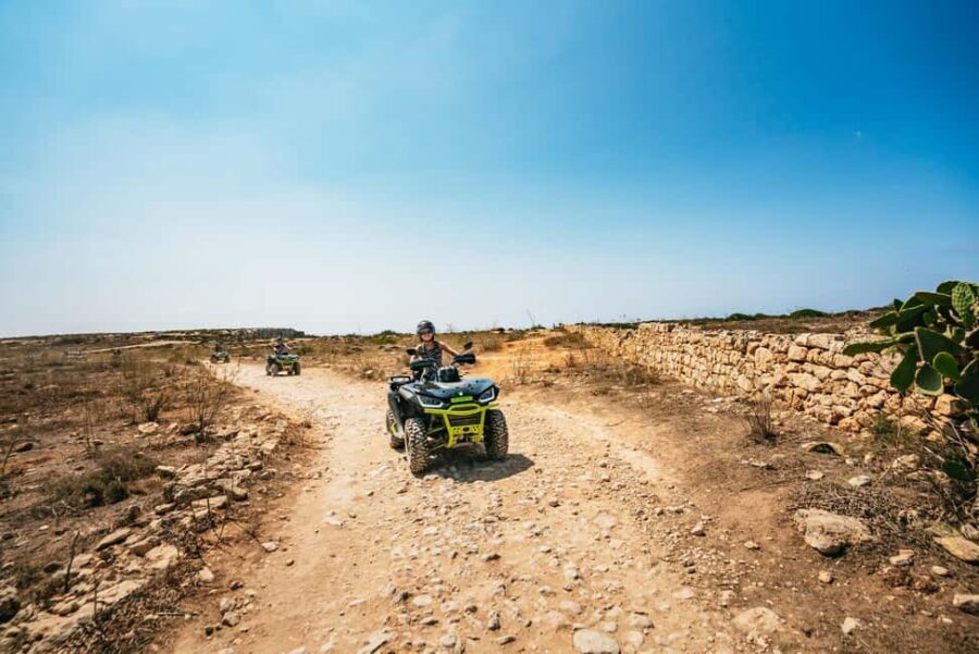 From Malta: Gozo & Comino Quad Bike & Boat Tour with Lunch - Wied il-Mielaħ Window, Għasri Valley, and Crystal Lagoon