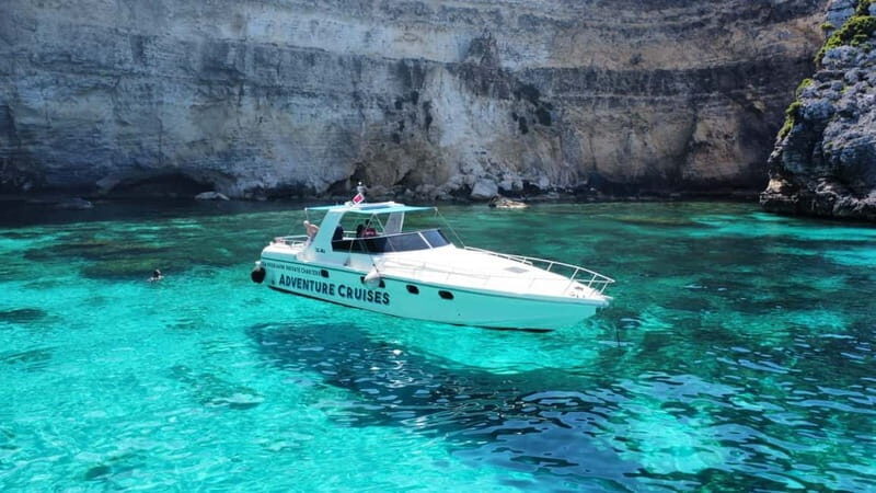 From Sliema: Private Comino and Gozo Boat Charter - Comino Island: Crystal Lagoon, Blue Lagoon, and caves from a powerboat