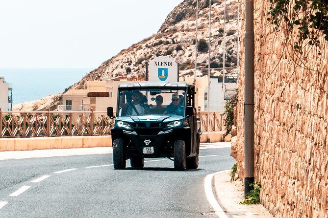 Gozo 4x4 Chauffeured Buggy Tour with Lunch and Transport - Lunch with local wine, a seasonal swim stop, and the Comino return boat