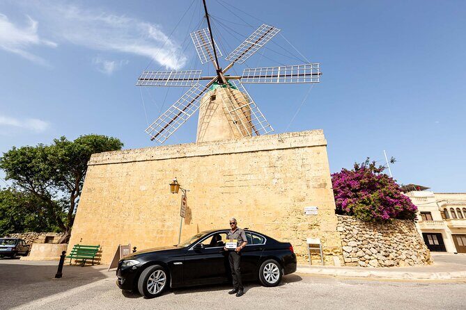 Gozo Highlights Tour in a comfortable private vehicle - Stop 6: Xwejni Salt Pans near Marsalforn—chequerboard patterns and real local use