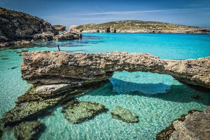 Half day Cruise - Comino, Gozo, Blue & Crystal Lagoon, and Caves - Mgarr Harbor in Gozo: A Quick Photo Stop That Sets Context