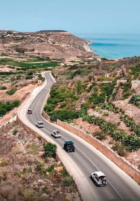 Malta: Around Comino Boat Trip with Gozo Guided Jeep Tour - Dwejra Bay Break Time and the Comino Boat Cruise: Caves and Cliff Drama