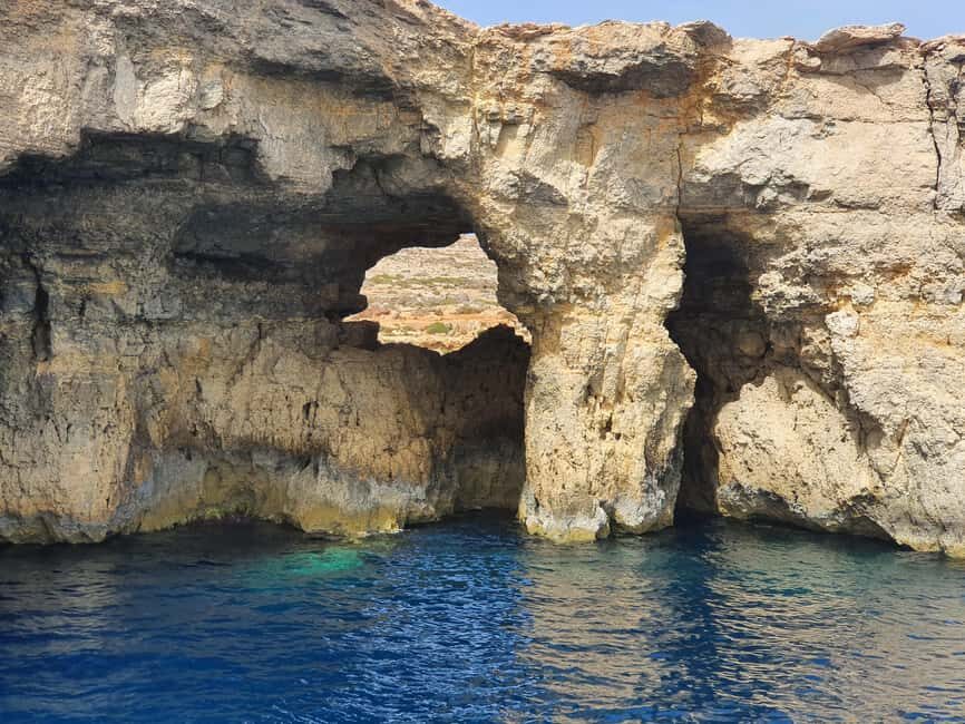 Malta: Comino, Blue Lagoon, Crystal Lagoon & Caves Cruise - Crystal Lagoon and St Mary’s Tower on the return route