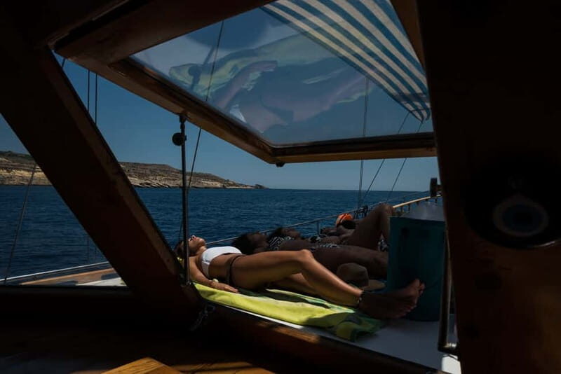 Malta: Comino, Blue Lagoon, + Sea Caves Day Trip - Onboard comfort: shower, toilets, and the “you can buy lunch” setup