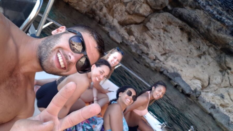 Malta: Private Sunset Boat Trip to Comino and Blue Lagoon - The Blue Lagoon Window: Photos and Swim Without the Stampede