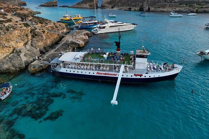 Malta Sunset Boat Tour: Bugibba to Comino Blue Lagoon Cruise - Comino Blue Lagoon: your two-hour window of swimming and walking