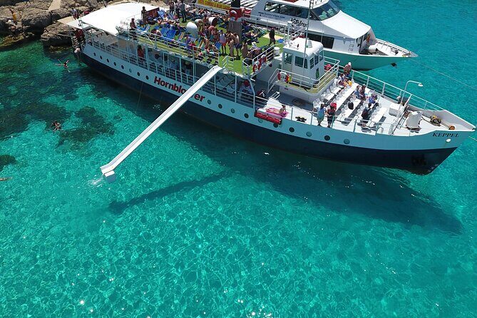 Malta Sunset Boat Tour: Bugibba to Comino Blue Lagoon Cruise - Crowds, sun-deck seating, and how to avoid a frustrating evening