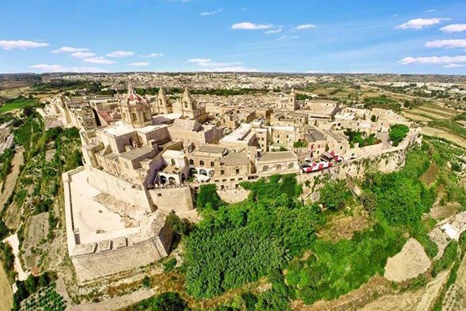 Mosta Crafts Village Mdina and Valletta Full Day Tour - Stop 1: Mosta Rotunda Basilica and the WWII Survival Story