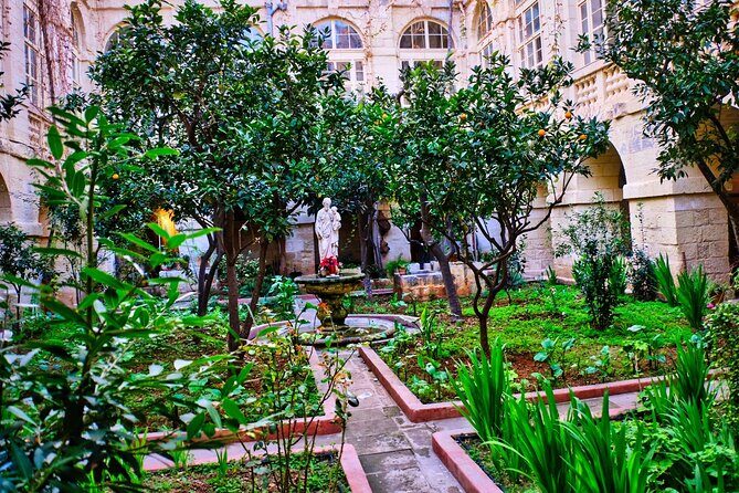 Mysteries in a Valletta Monastery - Guided Tour - Stop 1 in Valletta: decoding three historic street niches
