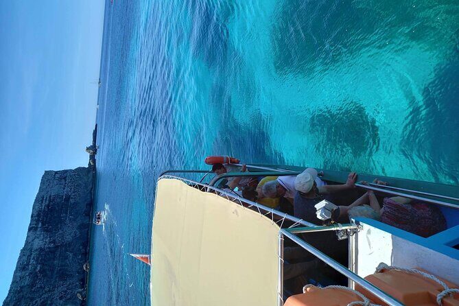 Private Boat charter to Crystal & Blue Lagoon, Caves & Comino - Crystal Lagoon: Cave Swims, Cliff Views, and a Movie Location