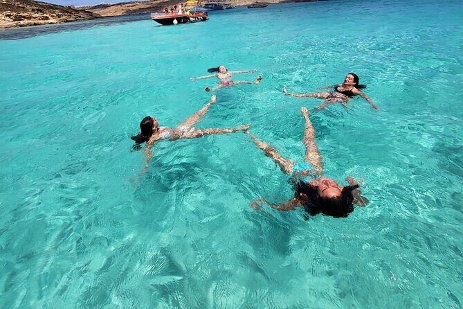 Private Boat Tour at Comino's Blue Lagoon and Crystal Lagoon - Popeye Cave (L-Għar ta’ Bla Saqaf) and the sunlight effect