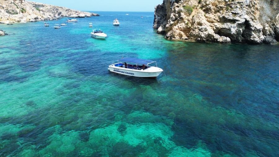 Sliema: Boat Trip to Comino Blue Lagoon, Gozo, and Caves - The Ħalfa Rock swim in Gozo: a different coast and another water reset