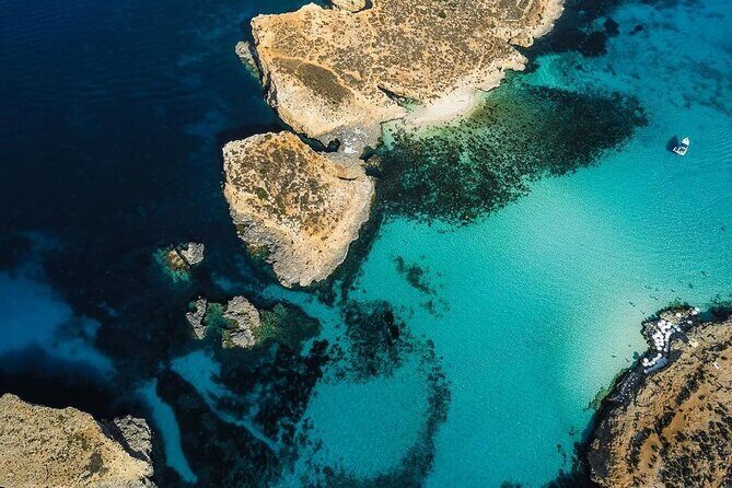 Snorkeling in Blue Lagoon Beaches and Bays Trip Comino - San Niklaw Bay: the quieter cove (and why it can be a mixed bag)