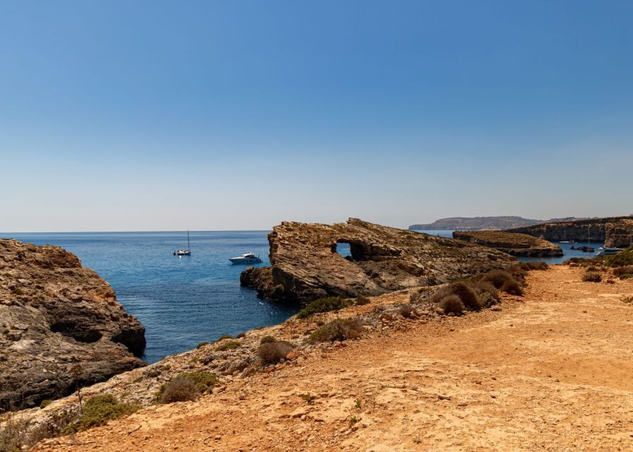 St Paul's Bay: Comino, Blue Lagoon, Gozo, & Caves Boat Tour - The Onboard Experience: Live English, Toilets, and Crew Momentum