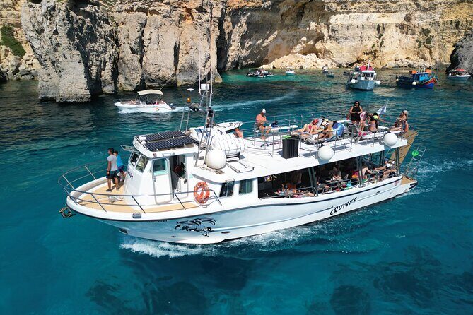 Three Bay Cruise Including Blue Lagoon from Mellieha - Crew service, onboard basics, and the snack-bar reality