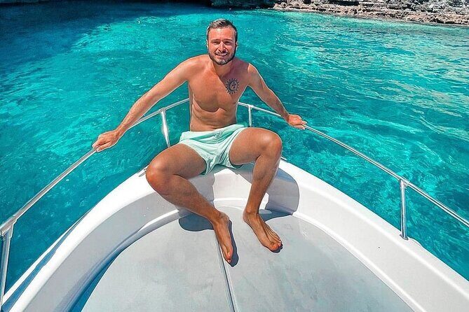 Tour in Malta Boat Charter to Comino and Gozoand Blue Lagoon - Santa Marija Bay: Horseshoe Sand, Hidden Caves, and Great Snorkel Conditions